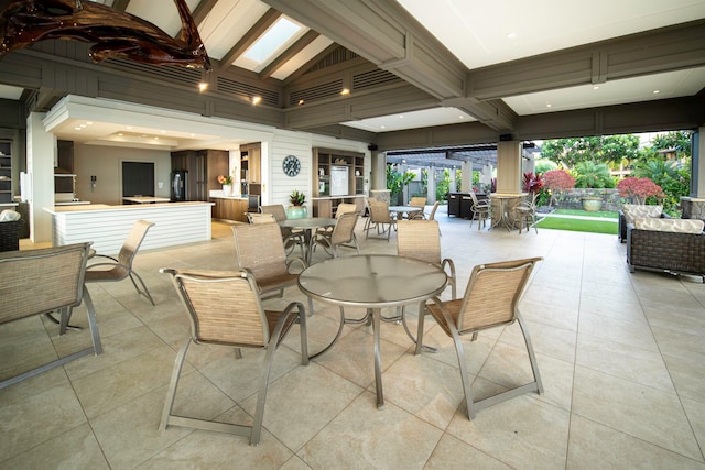 view of patio featuring ceiling fan