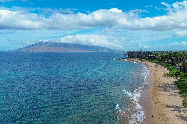 property view of water featuring a view of the beach and a mountain view