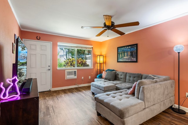 living room with hardwood / wood-style flooring, ceiling fan, an AC wall unit, and crown molding