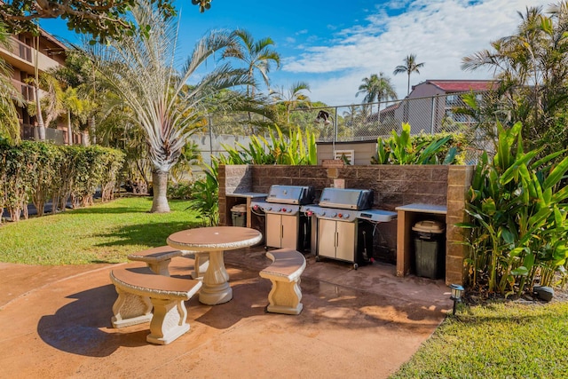 view of patio / terrace featuring a grill