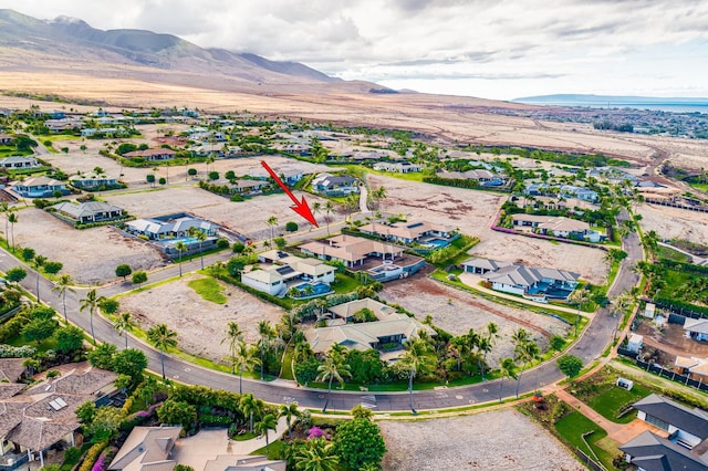 drone / aerial view featuring a mountain view