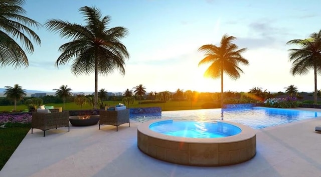 view of swimming pool featuring an in ground hot tub, pool water feature, and a patio area