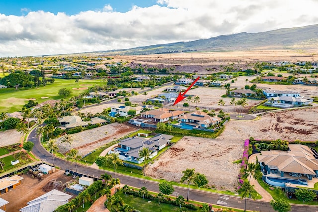 drone / aerial view featuring a mountain view