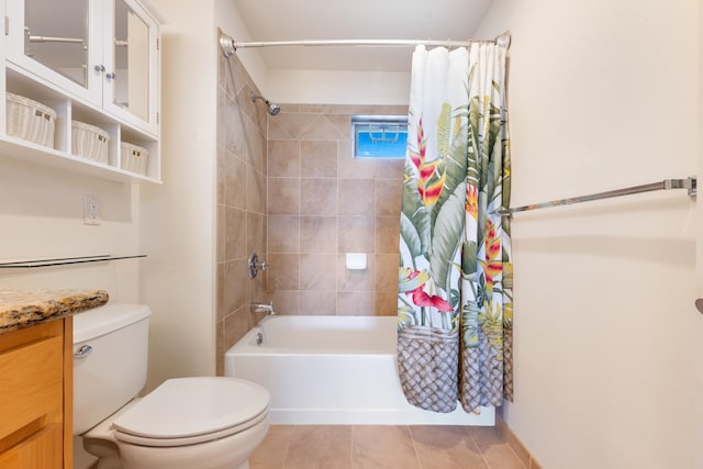 full bathroom with tile patterned flooring, vanity, toilet, and shower / bath combo with shower curtain