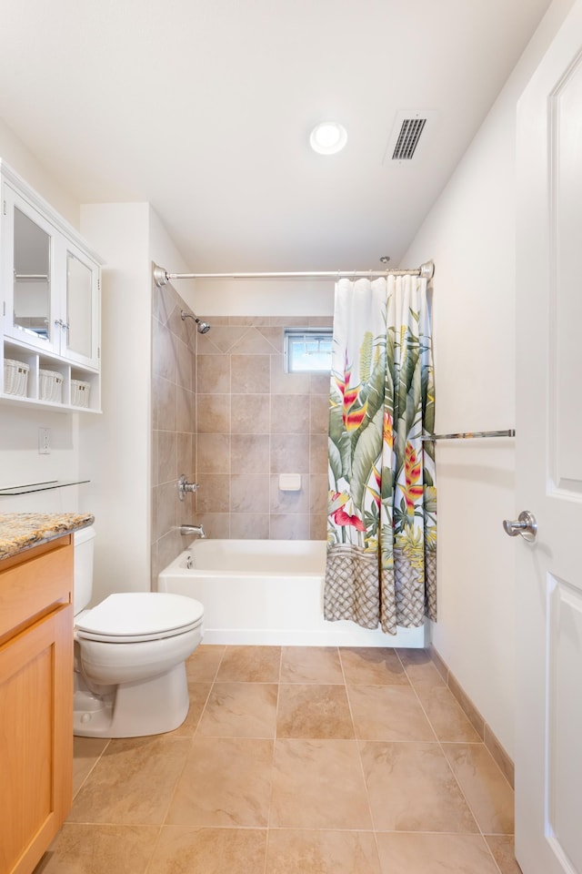 full bathroom featuring shower / bath combo, vanity, toilet, and tile patterned floors