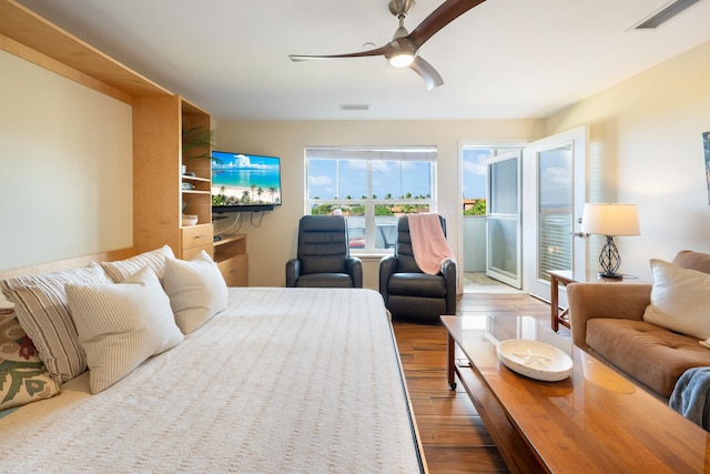 bedroom featuring ceiling fan and wood-type flooring