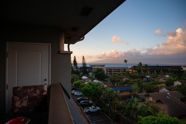 view of balcony at dusk