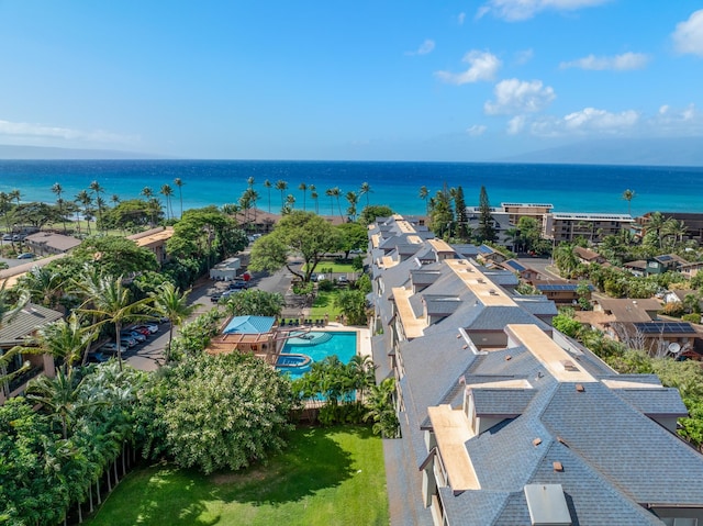 drone / aerial view with a water view