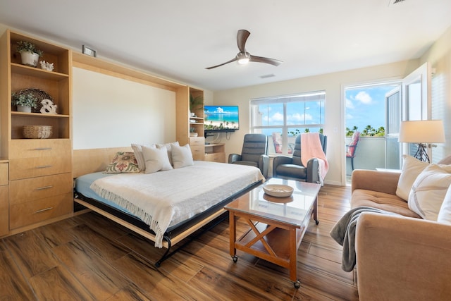 bedroom featuring wood-type flooring and ceiling fan