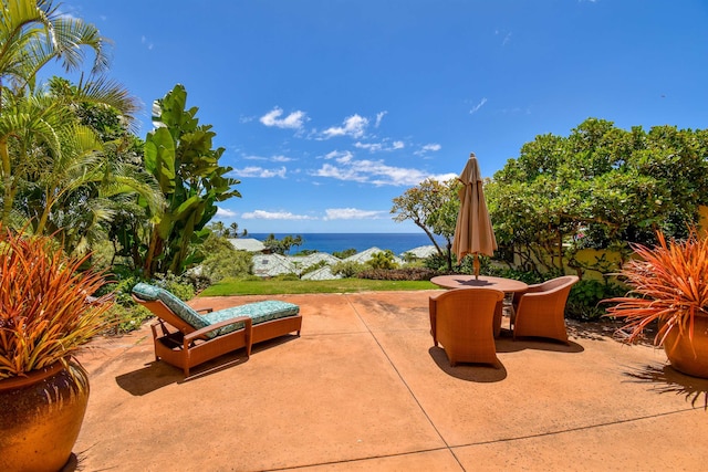 view of patio featuring a water view