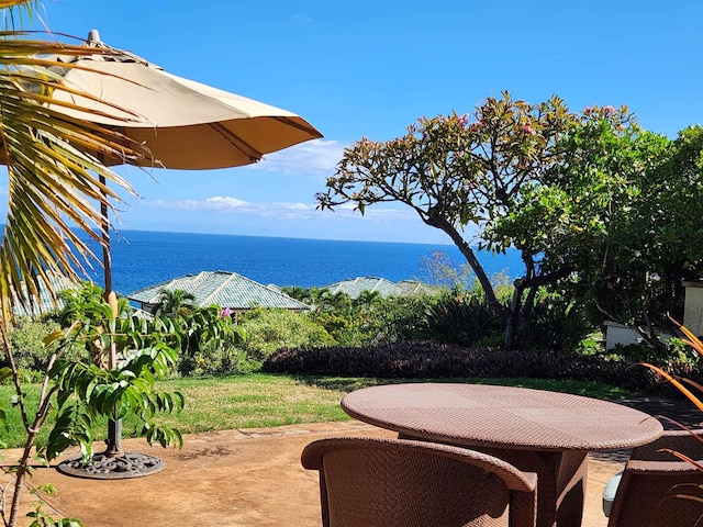 view of patio featuring a water view