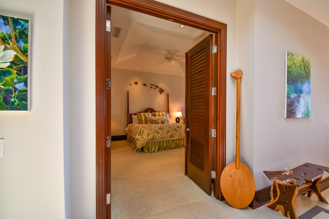 hallway with light tile patterned floors