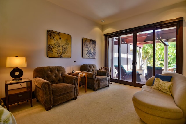 living room with light colored carpet and french doors