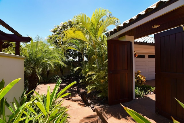 view of patio featuring a garage