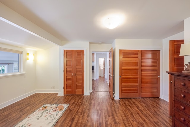 1220 W Kuiaha Rd, Haiku, HI 96708 - unfurnished bedroom featuring a closet and dark wood finished floors