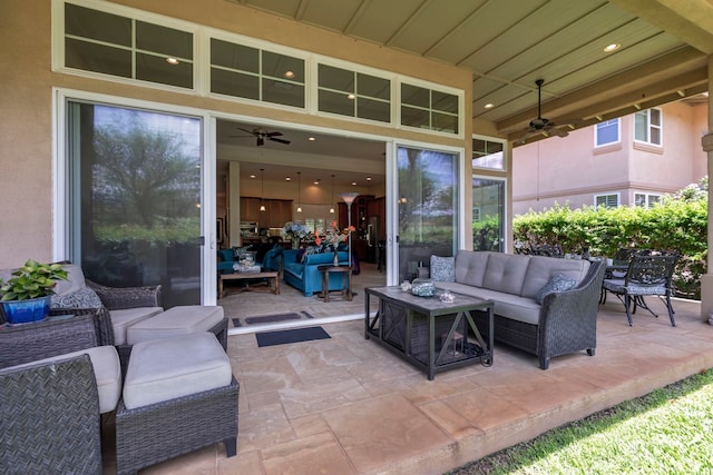 view of patio with ceiling fan and an outdoor hangout area