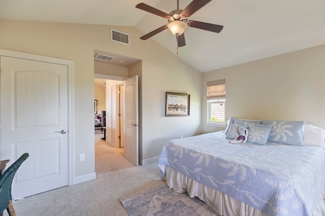 bedroom featuring ceiling fan, lofted ceiling, and light carpet