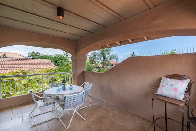 view of patio with a balcony