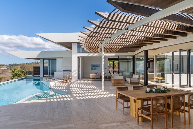 14 Halapa Pl, Kihei, HI 96753 - rear view of property with a pergola, outdoor dining space, an outdoor pool, and a patio