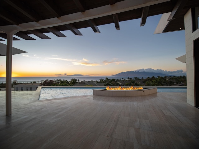 14 Halapa Pl, Kihei, HI 96753 - pool at dusk with a mountain view, a pool, and a patio area