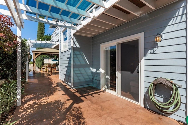 view of patio with a gazebo and a pergola