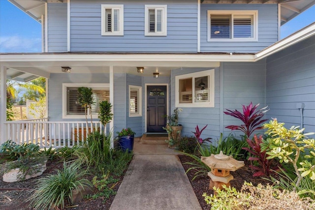 doorway to property with covered porch