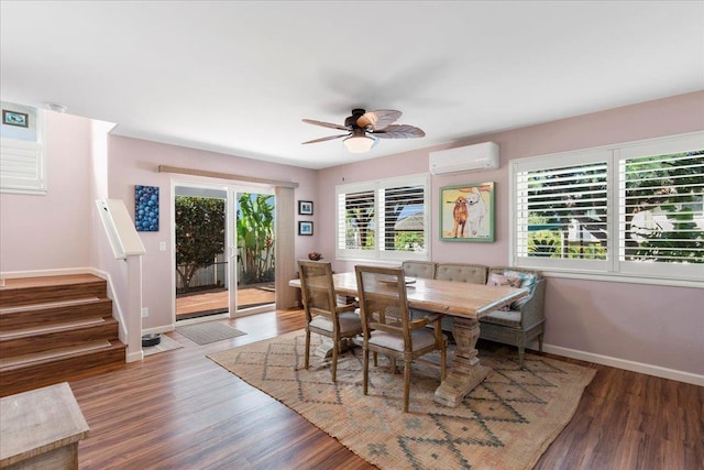 dining room with plenty of natural light, ceiling fan, dark hardwood / wood-style flooring, and a wall mounted AC