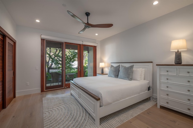 bedroom featuring ceiling fan, light wood-type flooring, access to outside, and a closet