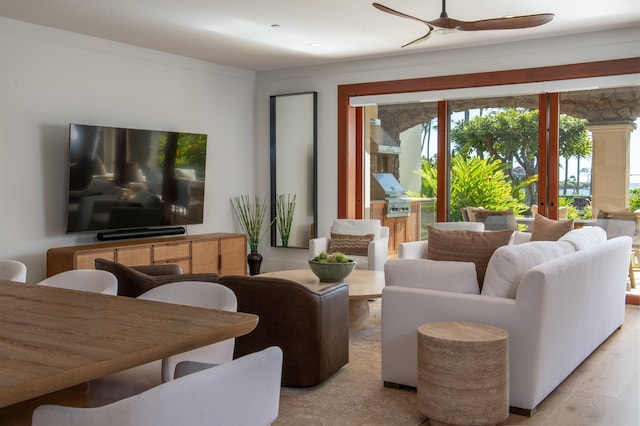 living room featuring light hardwood / wood-style floors and french doors