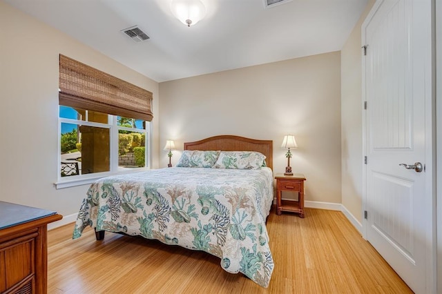 bedroom featuring hardwood / wood-style floors