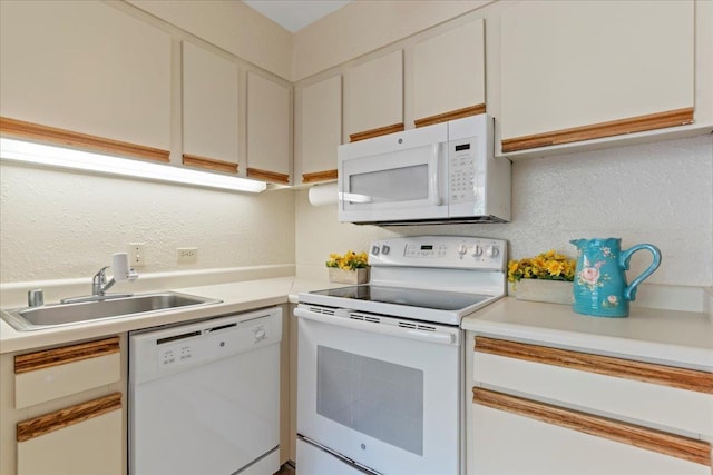 3615 Lower Honoapiilani Rd Unit 317, Lahaina, HI 96761 - kitchen with white appliances, light countertops, and a textured wall