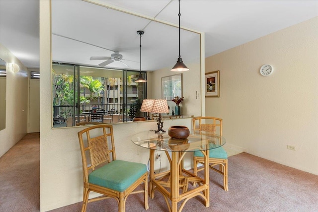 3615 Lower Honoapiilani Rd Unit 317, Lahaina, HI 96761 - dining space with plenty of natural light, a ceiling fan, and carpet flooring
