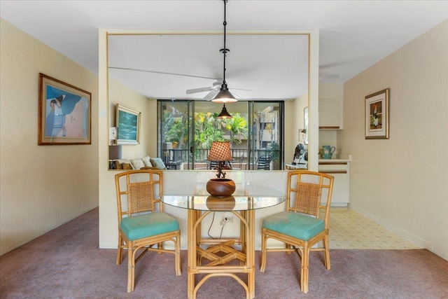 3615 Lower Honoapiilani Rd Unit 317, Lahaina, HI 96761 - carpeted dining room featuring a ceiling fan
