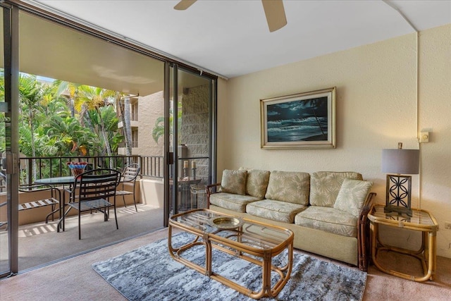 3615 Lower Honoapiilani Rd Unit 317, Lahaina, HI 96761 - living room featuring ceiling fan, carpet flooring, and a textured wall