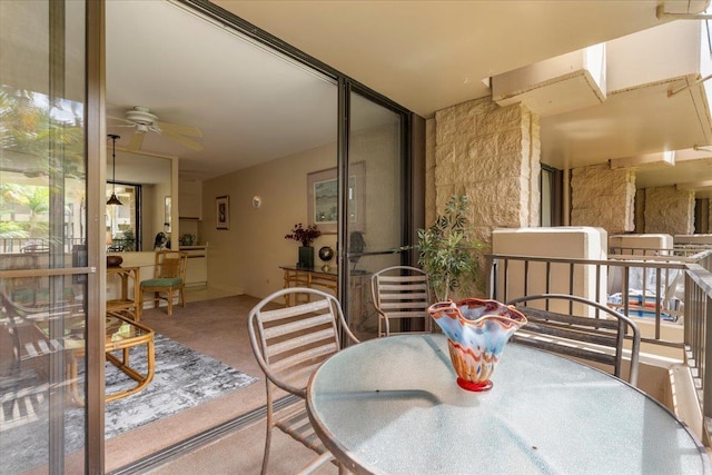 3615 Lower Honoapiilani Rd Unit 317, Lahaina, HI 96761 - balcony with a ceiling fan and outdoor dining area