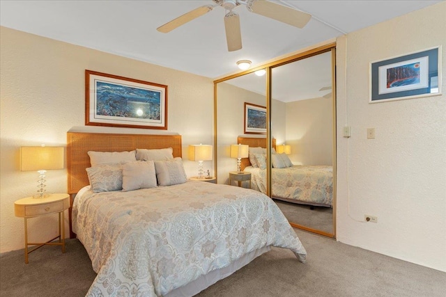 3615 Lower Honoapiilani Rd Unit 317, Lahaina, HI 96761 - carpeted bedroom with a closet, a ceiling fan, and a textured wall