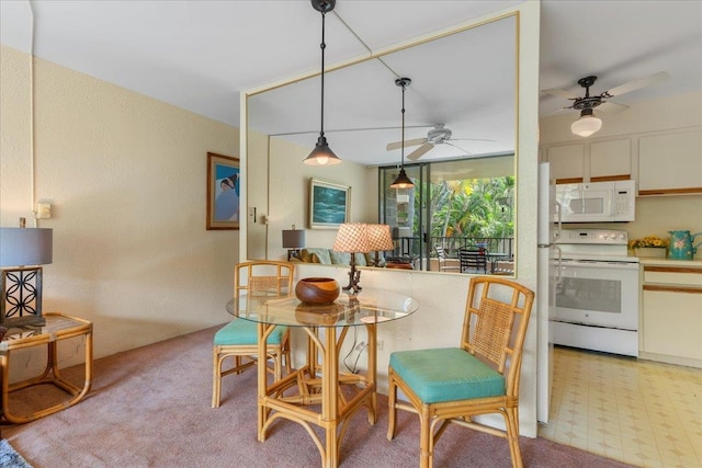 dining area featuring ceiling fan