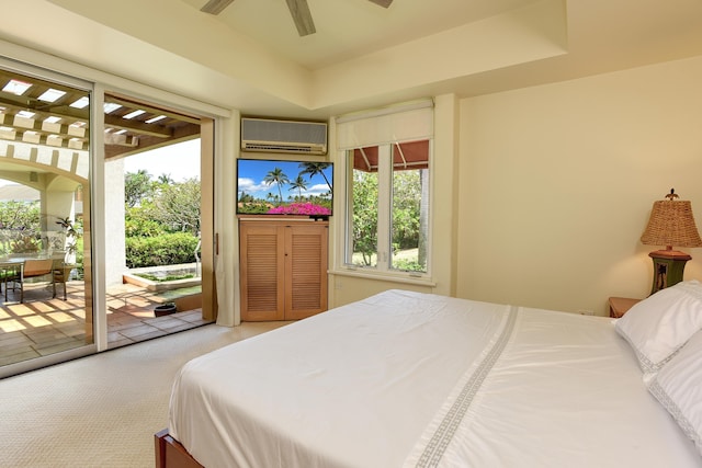 3150 Wailea Alanui Dr Unit 3807, Kihei, HI 96753 - bedroom with access to outside, light colored carpet, a wall unit AC, and multiple windows