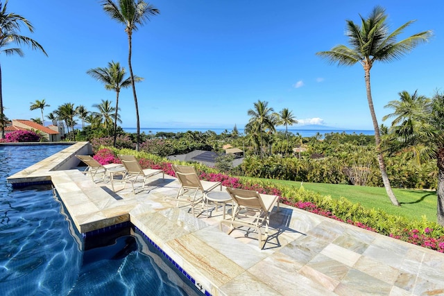 3150 Wailea Alanui Dr Unit 3807, Kihei, HI 96753 - outdoor pool with a patio and a yard
