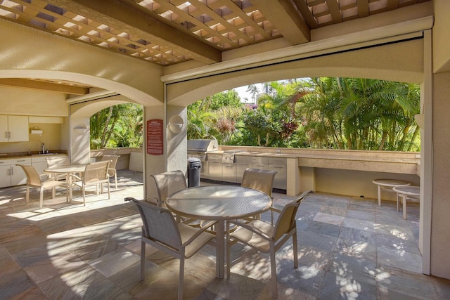 3150 Wailea Alanui Dr Unit 3807, Kihei, HI 96753 - view of patio / terrace featuring a sink, grilling area, an outdoor kitchen, and outdoor dining space