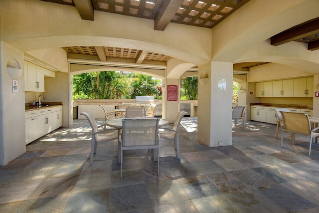 3150 Wailea Alanui Dr Unit 3807, Kihei, HI 96753 - view of patio featuring a sink, outdoor dining space, and exterior kitchen