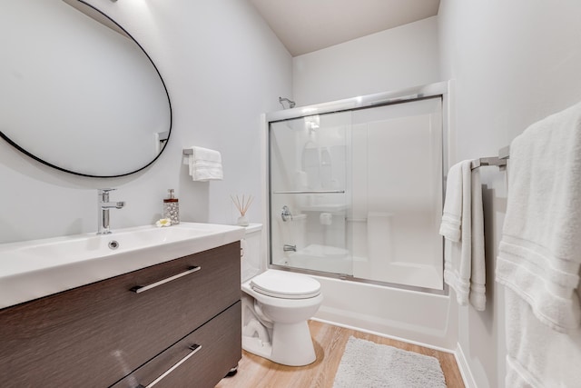 9 Fern Pl, Lahaina, HI 96761 - bathroom featuring toilet, enclosed tub / shower combo, wood finished floors, and vanity
