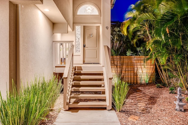 9 Fern Pl, Lahaina, HI 96761 - view of exterior entry featuring stucco siding