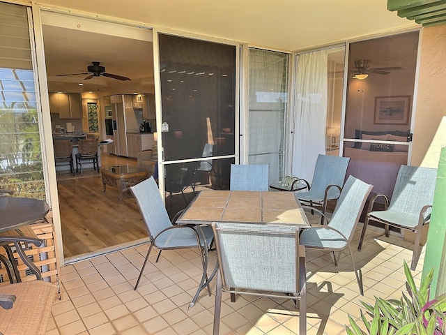 view of patio / terrace featuring ceiling fan