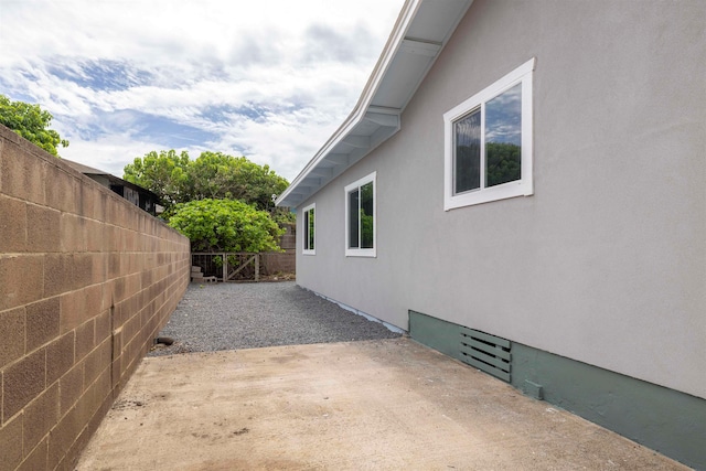 view of home's exterior featuring a patio