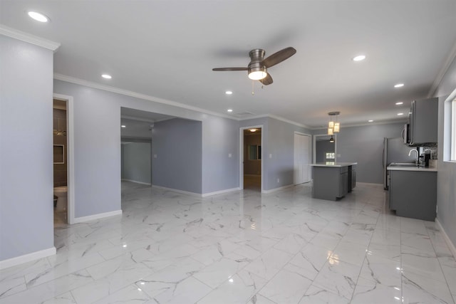 585 Linekona Pl, Wailuku, HI 96793 - unfurnished living room with baseboards, a ceiling fan, recessed lighting, crown molding, and a sink