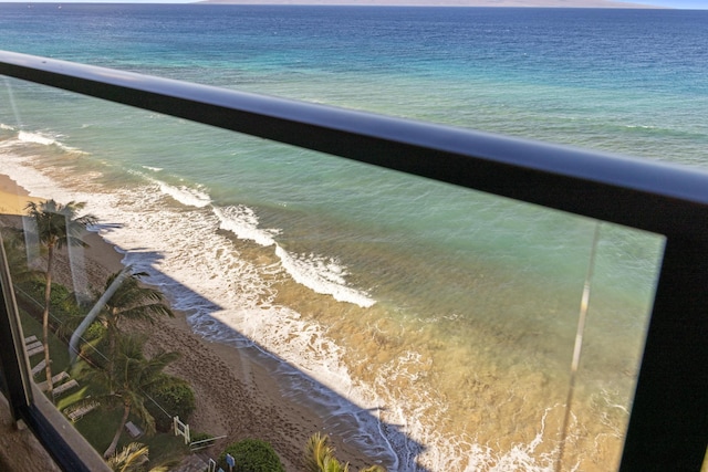 property view of water featuring a beach view