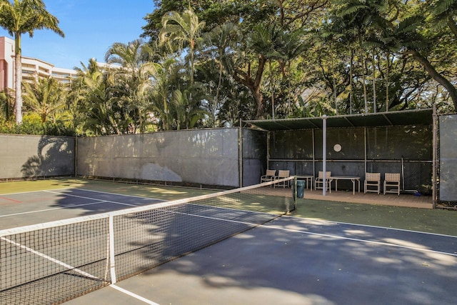 view of sport court featuring basketball hoop