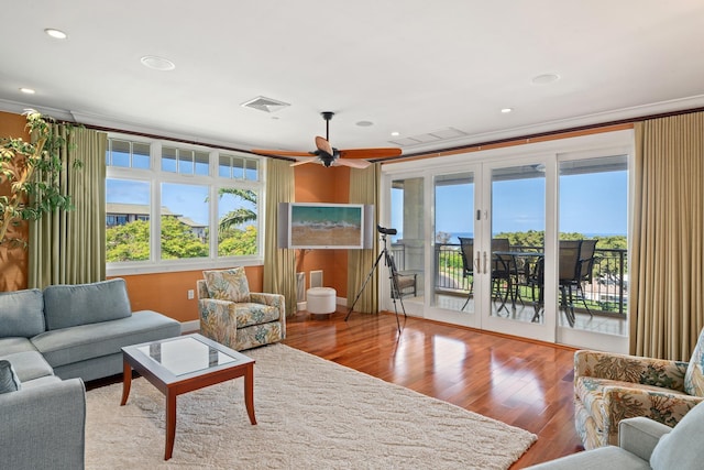 161 Wailea Ike Pl Unit D201, Kihei, HI 96753 - living area featuring wood finished floors, recessed lighting, ornamental molding, and ceiling fan