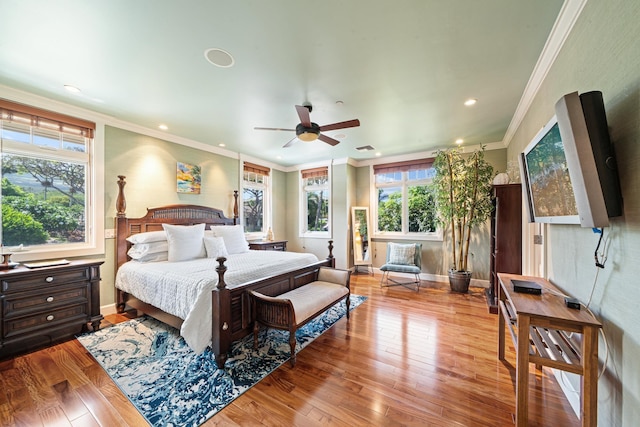 161 Wailea Ike Pl Unit D201, Kihei, HI 96753 - bedroom with ornamental molding, wood-type flooring, baseboards, and recessed lighting